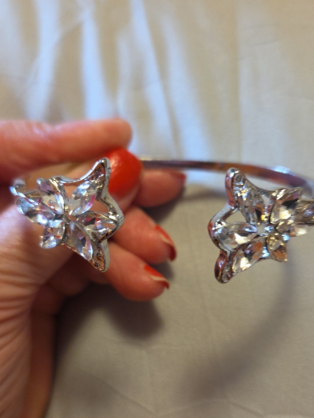 Silver Cuff Bracelet Open ended with flowers.